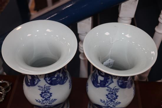 A pair of late 20th century Chinese blue and white boys vases H.34cm